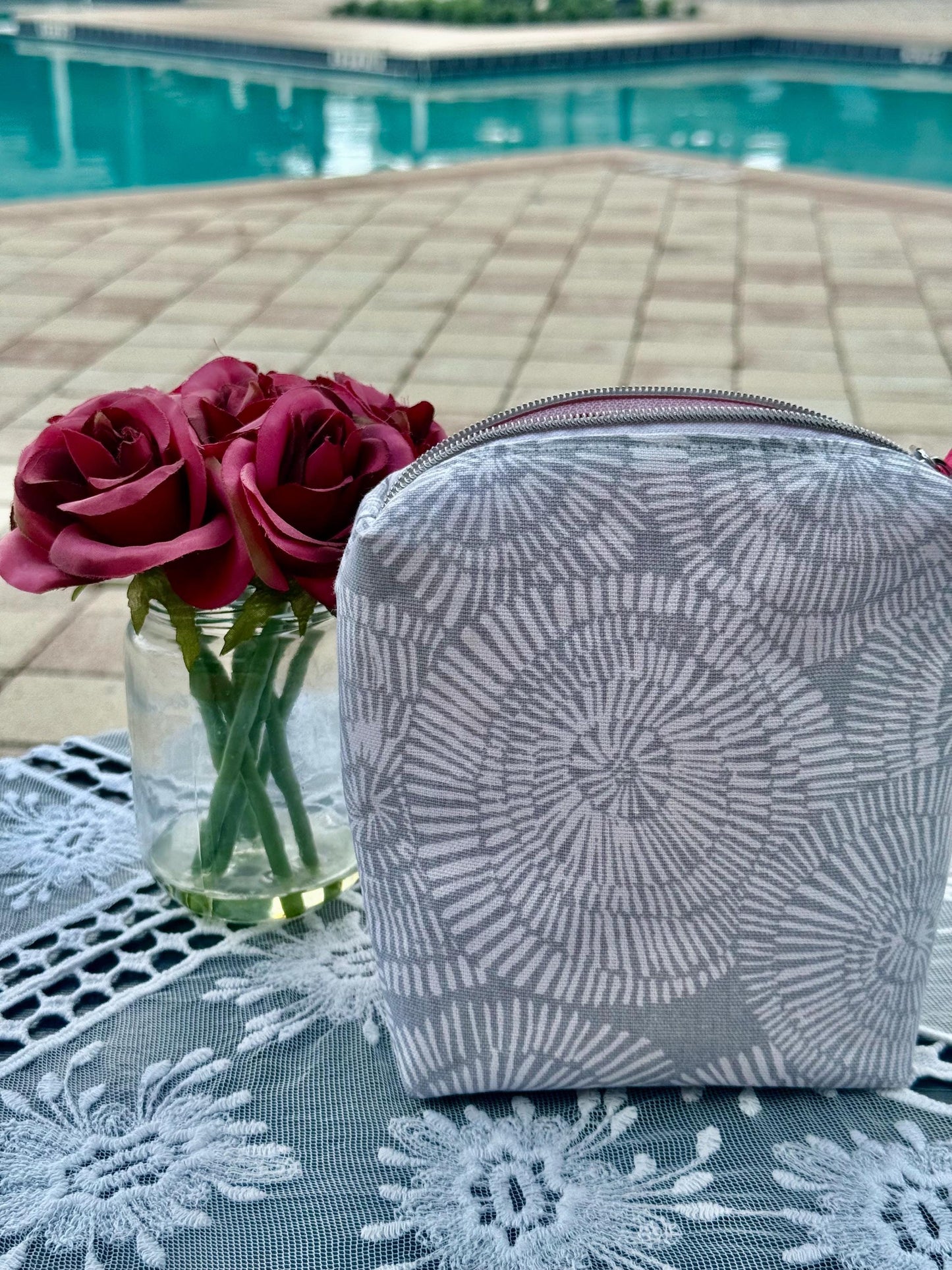 Purse storage bag, toiletry bag, cream color with pink lining fabric. Perfect for a travel bag to keep in your car or your purse