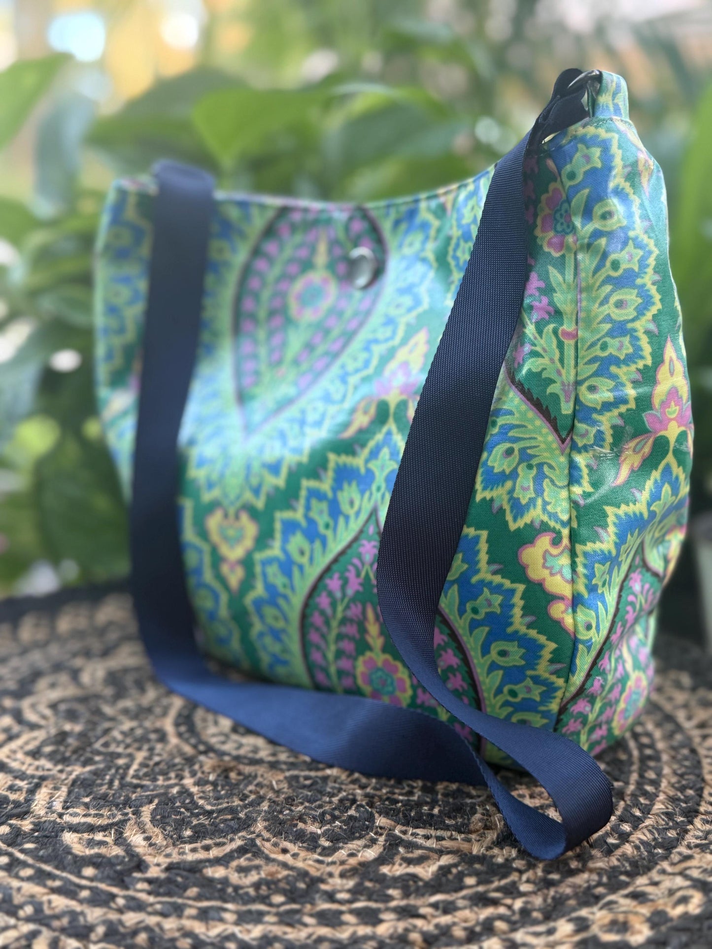 Small shoulder bag, lightweight carrying purse, laminated cotton fabric purse, handmade shoulder bag, seatbelt strap, button closure.
