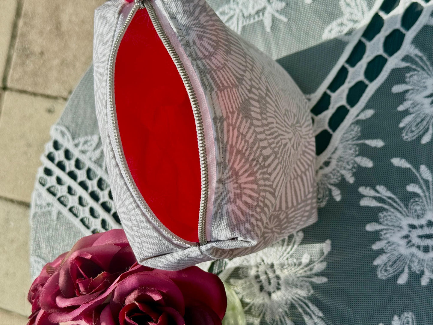 Purse storage bag, toiletry bag, cream color with pink lining fabric. Perfect for a travel bag to keep in your car or your purse