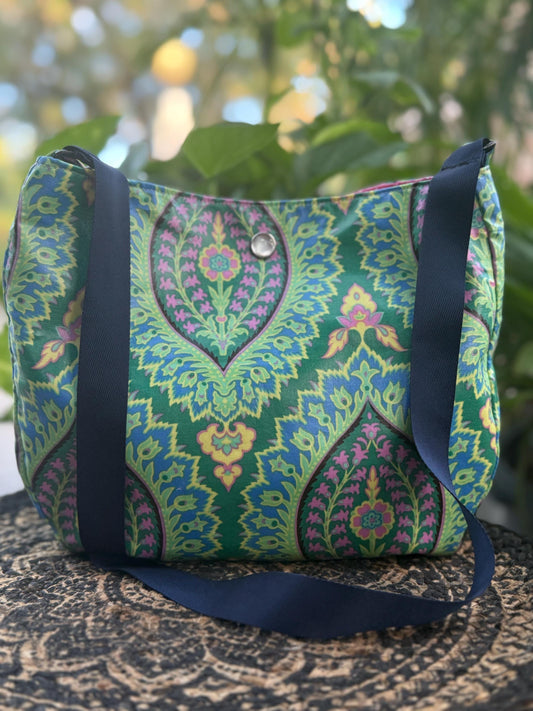 Small shoulder bag, lightweight carrying purse, laminated cotton fabric purse, handmade shoulder bag, seatbelt strap, button closure.