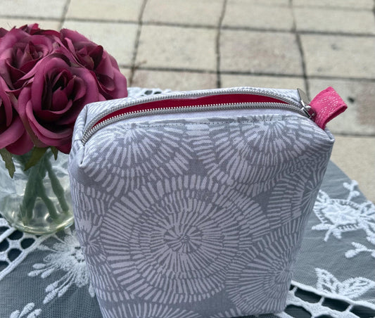 Purse storage bag, toiletry bag, cream color with pink lining fabric. Perfect for a travel bag to keep in your car or your purse