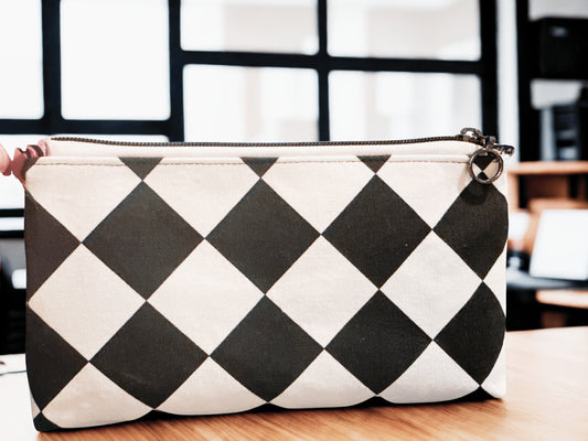 Stitchin’ by M.- Handheld Clutch