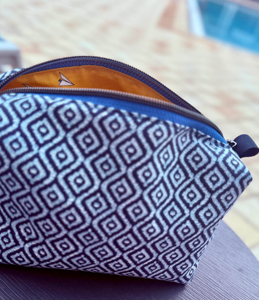 Box zippered bag with blue fabric, lined with yellow paper airplane printed fabric, carry-all makeup bag, handmade toiletries boxed bag